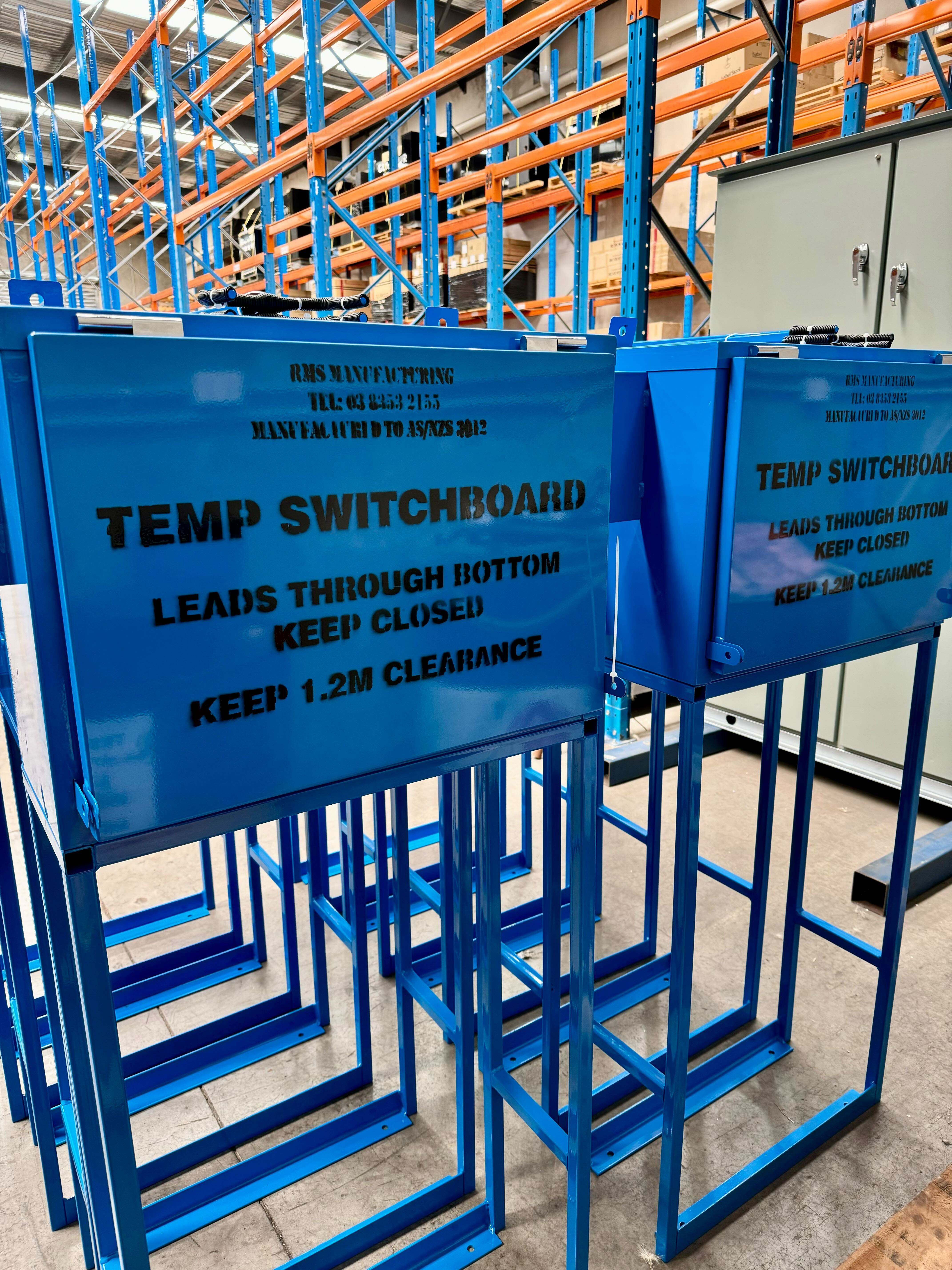 Blue temporary power boards manufactured by RMS Manufacturing